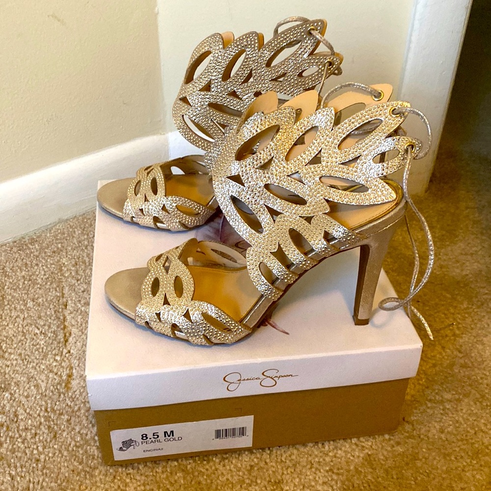 Stunning golden heels with tie up back!